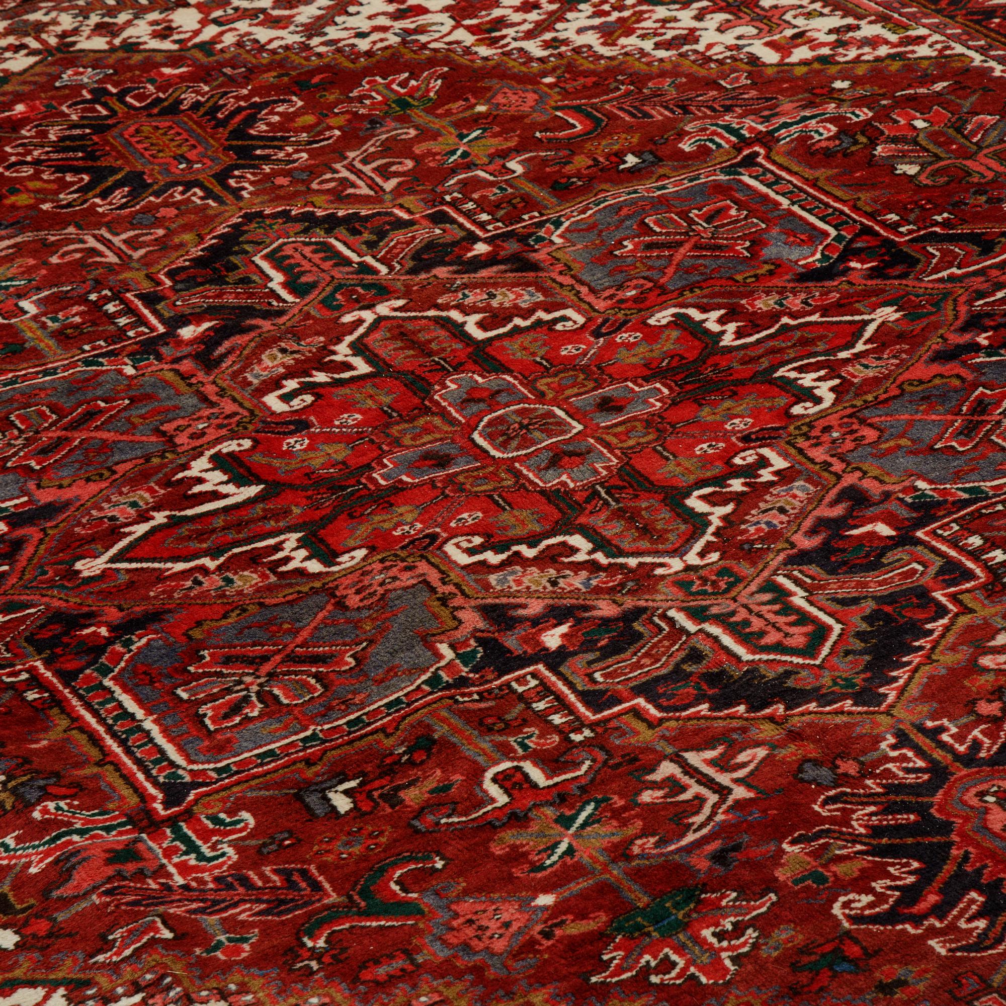 A carpet, semi-antique/old Heriz, ca 340 x 256 cm.