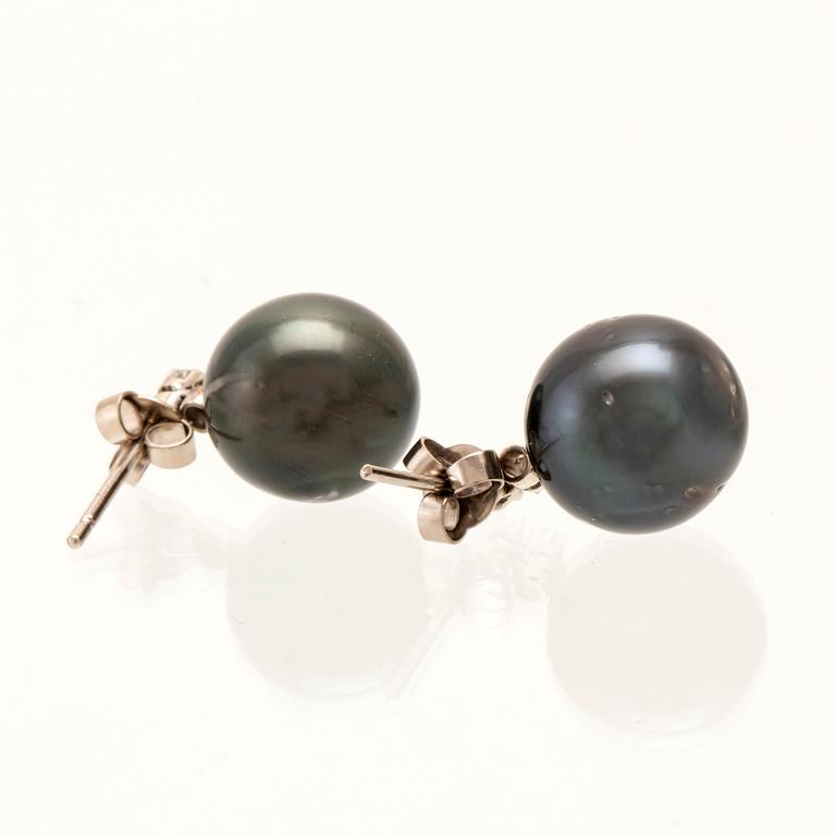 Earrings, a pair of 18K white gold with cultured pearls and round single-cut diamonds.