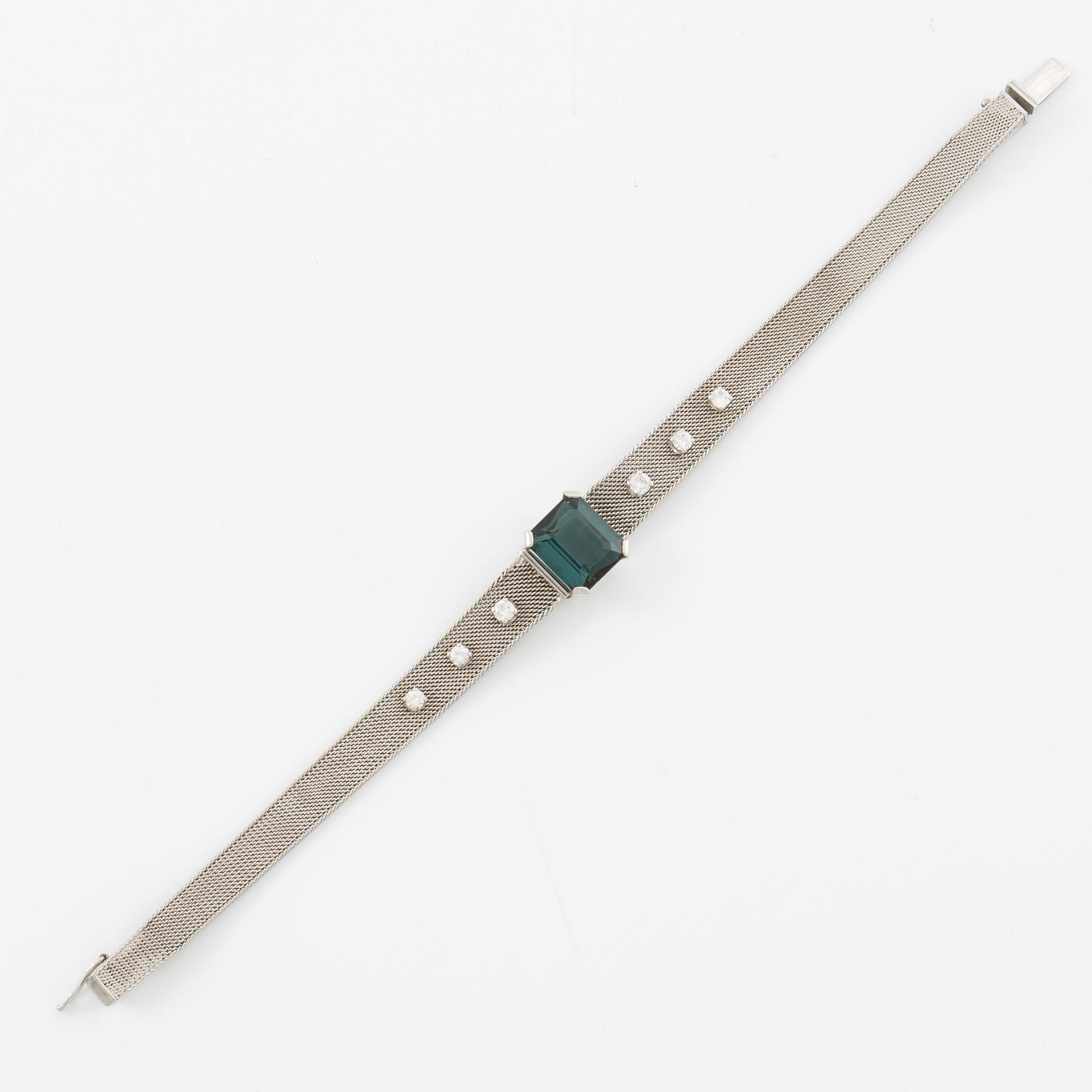 Armband 18K vitguld med en fasettslipad turmalin och runda briljantslipade diamanter.