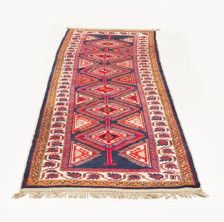 A semi-antique Meshkin runner, c. 356 x 123 cm.