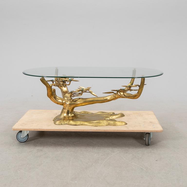 A brass and glass coffee table from the second half of the 20th century.