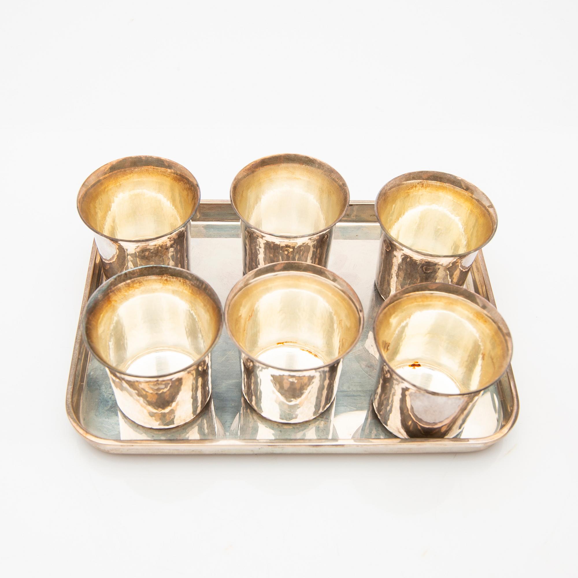 Cup and saucer set, 7 pieces, sterling silver, Einar Telander, Stockholm 1976-79.