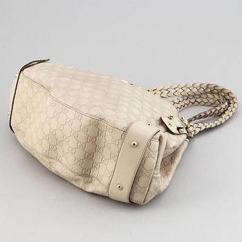 Gucci, leather bag.