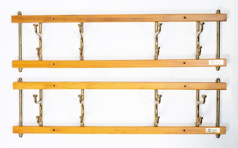 Klädhängare, ett par, "Dekorativ", Skoglunds metallgjuteri, Anderstorp, 1950/60-tal.