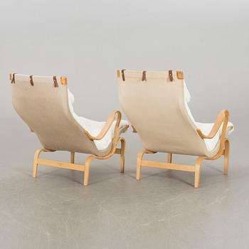 BRUNO MATHSSON, a pair of Pernilla, Dux lounge chair.