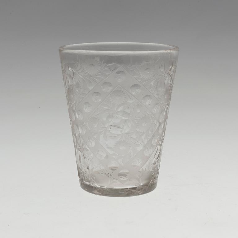 A CUT GLASS BAROQUE BEAKER, 18th century.