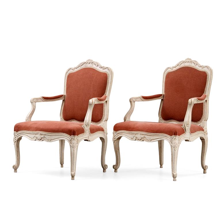 A large pair of Swedish Rococo 18th century armchairs.