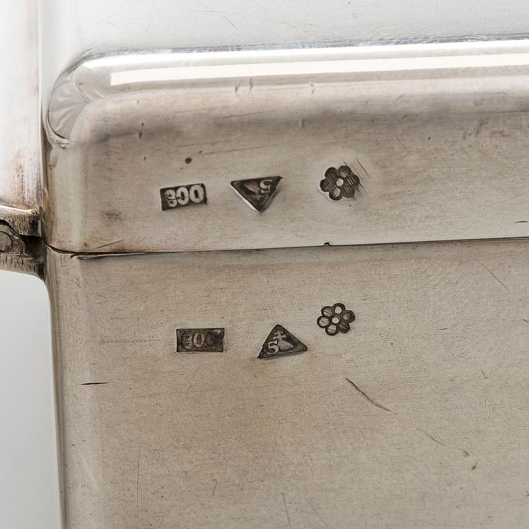 A silver cigarette case, matchbox holder and small bowl, Sandrik, as well as 3 ashtrays, Czechoslovakia 1929-1945.