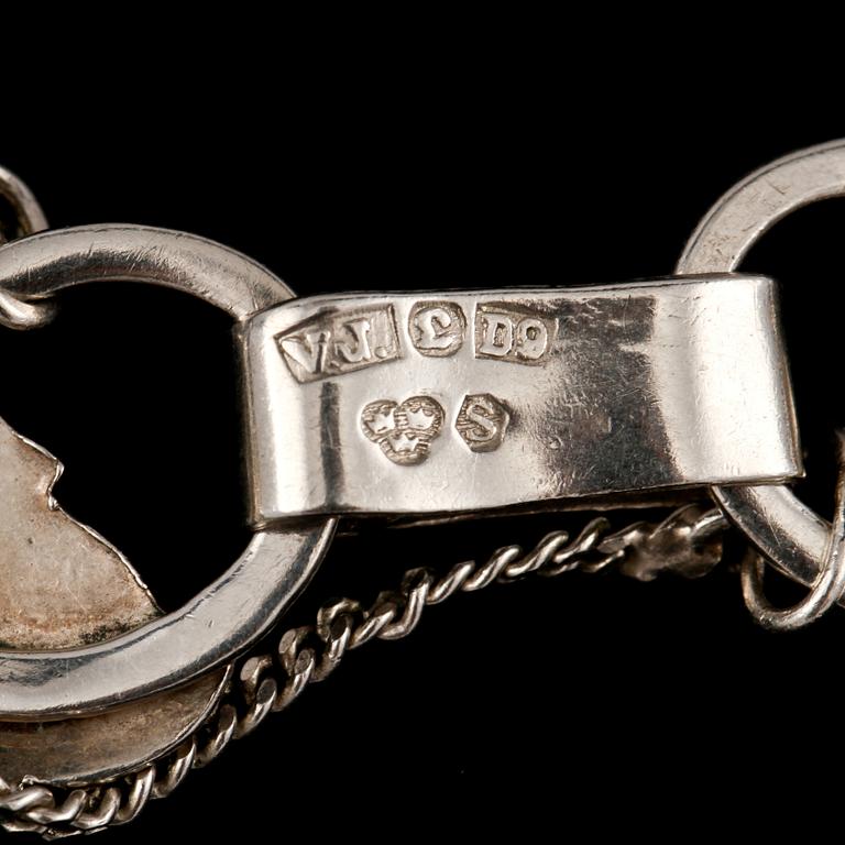 ARMRING, silver och markasiter, Victor Janson, Lindesberg, 1954. Vikt 22 g.