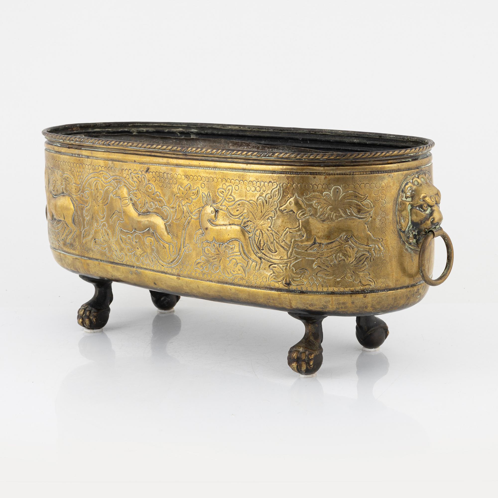 A 19th century brass jardinière.