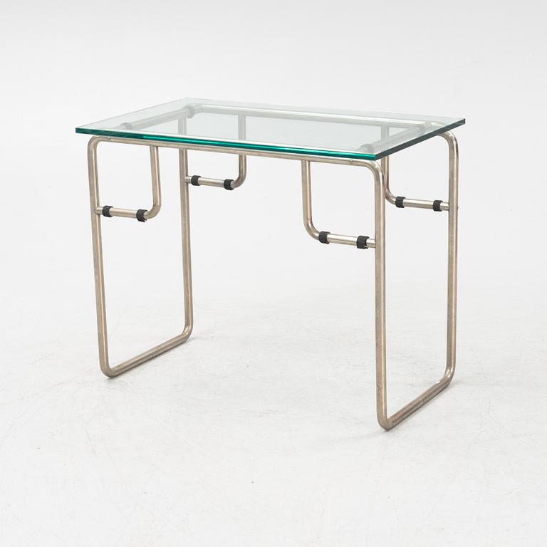 A steel and glass side table, 1920s/30s.