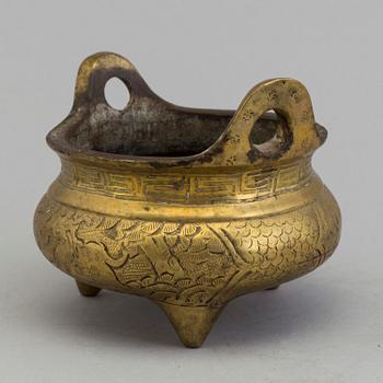 A Chinese early 20th century gilt-bronze censer, with Xuandes six character mark to the base.