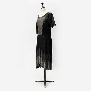 A 1920's pearl embroidered dress.