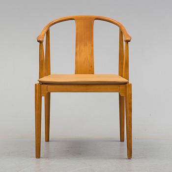 A 'China' chair by Hans J Wegner, for Fritz Hansen, Denmark, late 20th century.