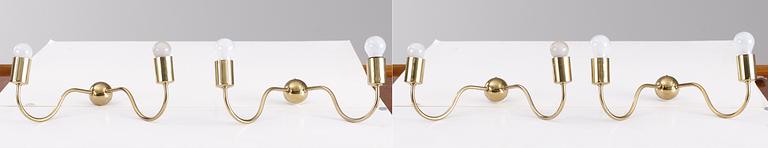 A set of 4 Josef Frank brass wall lamps, Svenskt Tenn, model 2435.