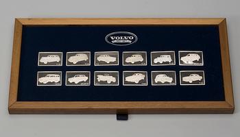 PLAKETTER, 12 st, "Volvo 1927-1977", sterlingsilver, vikt 226 g.