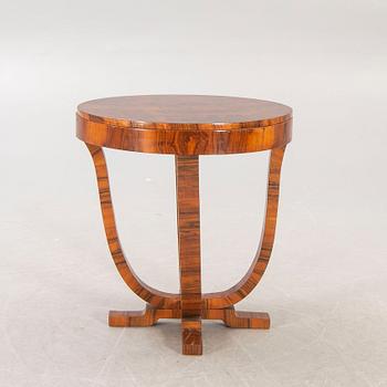 An Art Deco walnut coffee table first half of the 20th century.