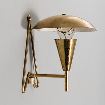 A mid-20th century wall light / table lamp, model EV 57 for Itsu, Finland.