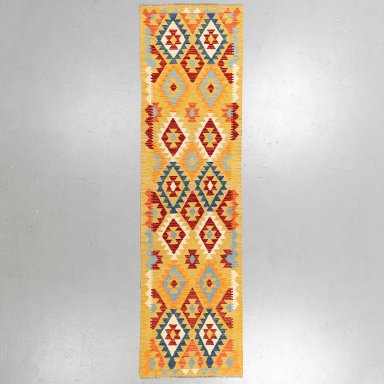 A runner, kilim 302 x 82 cm.