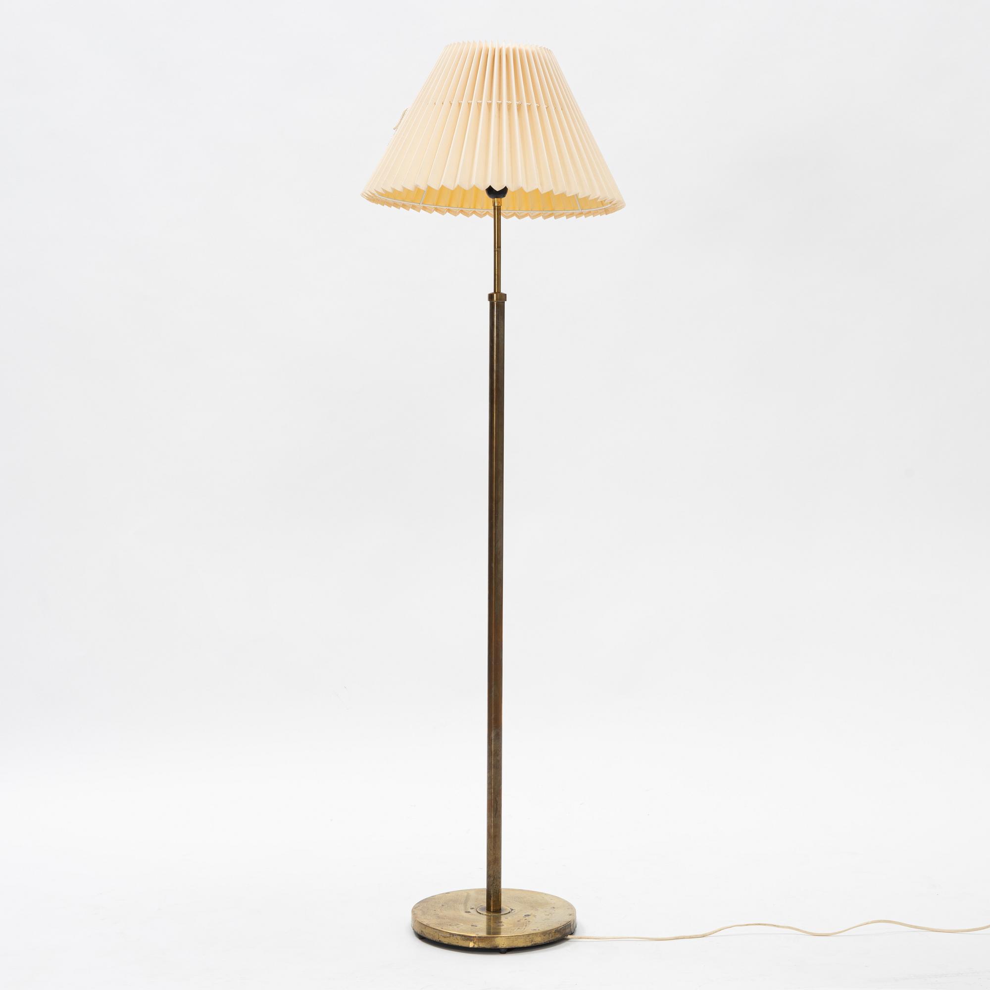 A brass floor light, seond part of the 20th Century.