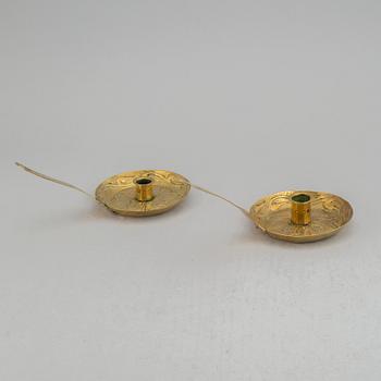 A pair of 19th century brass night light holders.