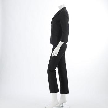DSQUARED, a black cotton and silk two-piece suit consisting of jacket and pants. Size 42.