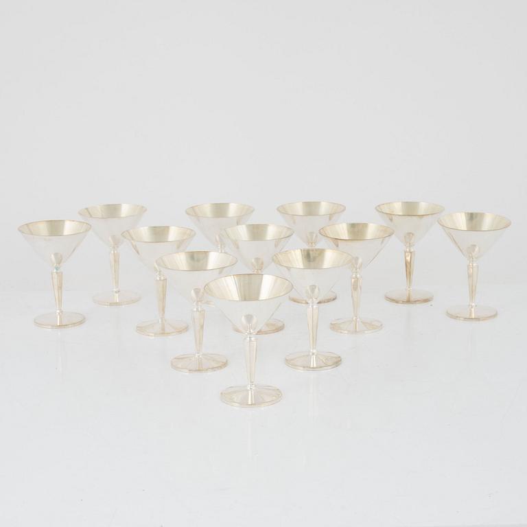 A set of twelve coctailglasses in siver, K&EC, Gothenburg, Sweden, 1962.