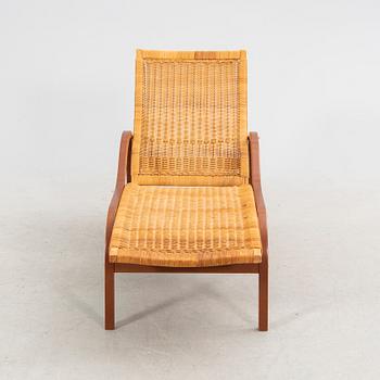 Karin Mobring & Thomas Jelinek, a "Stockholm" rattan easy chair for IKEA 1985-90.