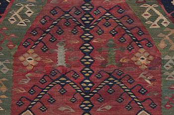 An antique Sarköy kelim, ca 239 x 214 cm.