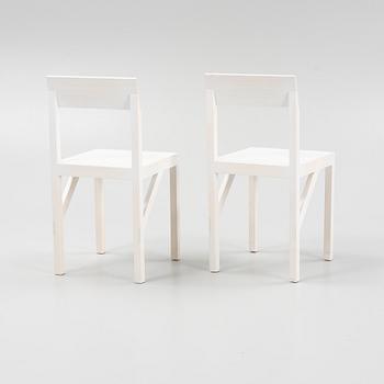 A pair of signed white stained pine chairs by Frederik Gustav for Frame, Copenhagen, 2023.