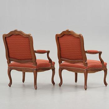 A pair of Louis XV 18th century armchairs.