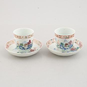 A Pair of Famille Rose export porcelain cups with saucers, China, Qianlong (1736-95).