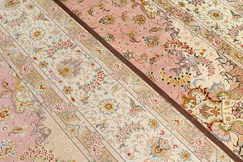 A Tabriz carpet, part silk, so-called 60 Raj, approx. 490 x 340 cm.