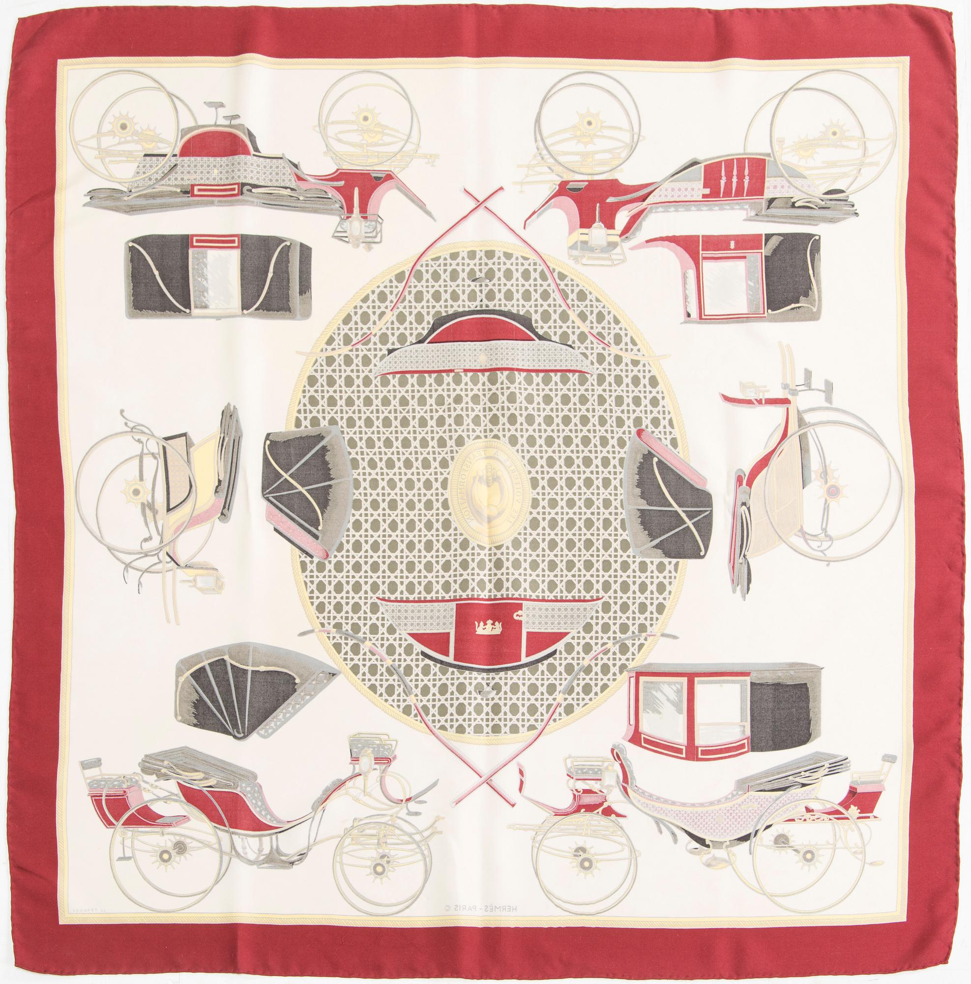 Hermès, a 'Les Voitures à Transformation' silk scarf.