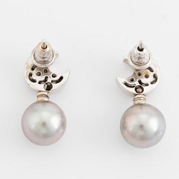 Brilliant cut diamond moon shape and cultured grey pearl earrings.