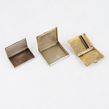 Three cigarette cases early 20th Century.