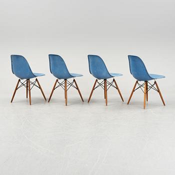A set of four Charles and Ray Eames 'Plastic Chair DSW' with later stands, designed 1950.