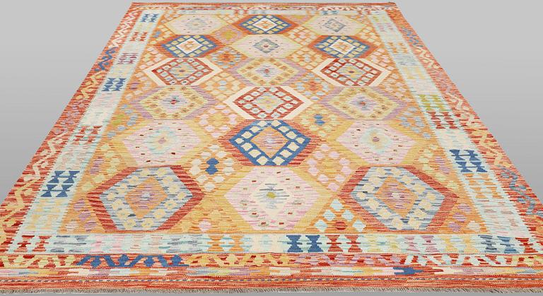 A Kilim rug, approx. 299 x 205 cm.