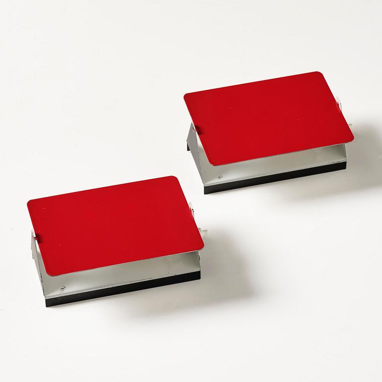 Charlotte Perriand, a pair of wall lights model "CP1", La Société Centrale d'Eclairage, France, 1960s.