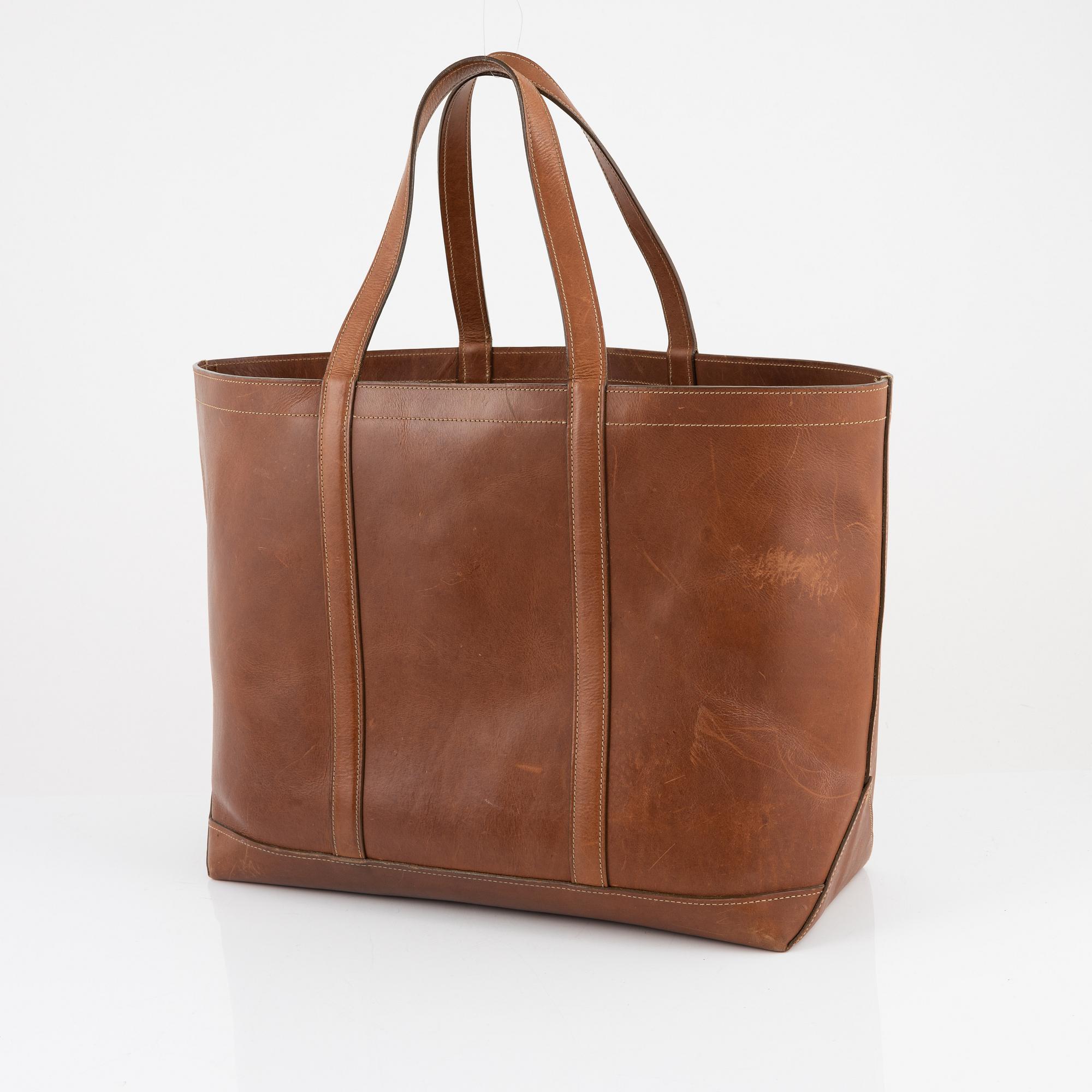 Mulberry, a brown leather 'Calder Tote' weekend bag.