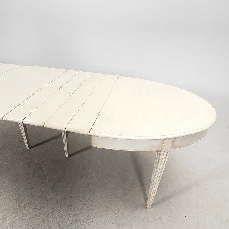 A painted 19th/20th Gustavian style dining table.