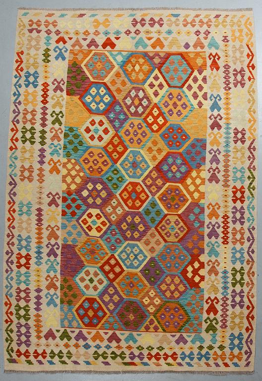 A carpet, kilim, ca 297 x 204 cm.