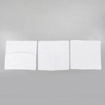 Three 19th century damask napkins.