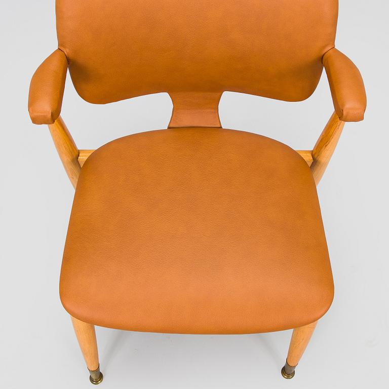 Ilmari Tapiovaara, a mid-20th century 'Domus Lux' armchair for Lukkiseppo.