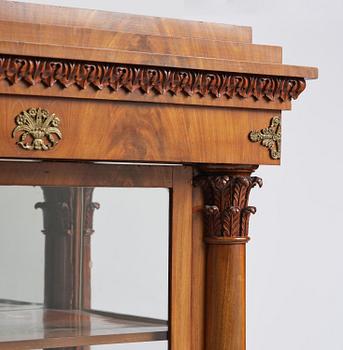 A Swedish Empire mahogany bibliothèque, ca 1830.
