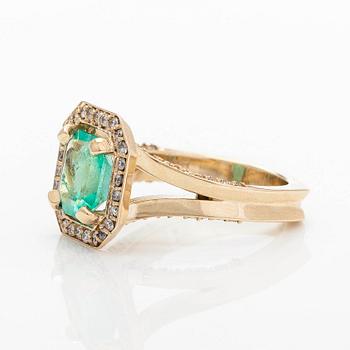 Ring, with an octagonal step-cut emerald and diamonds. Accompanied by GIA certificate.