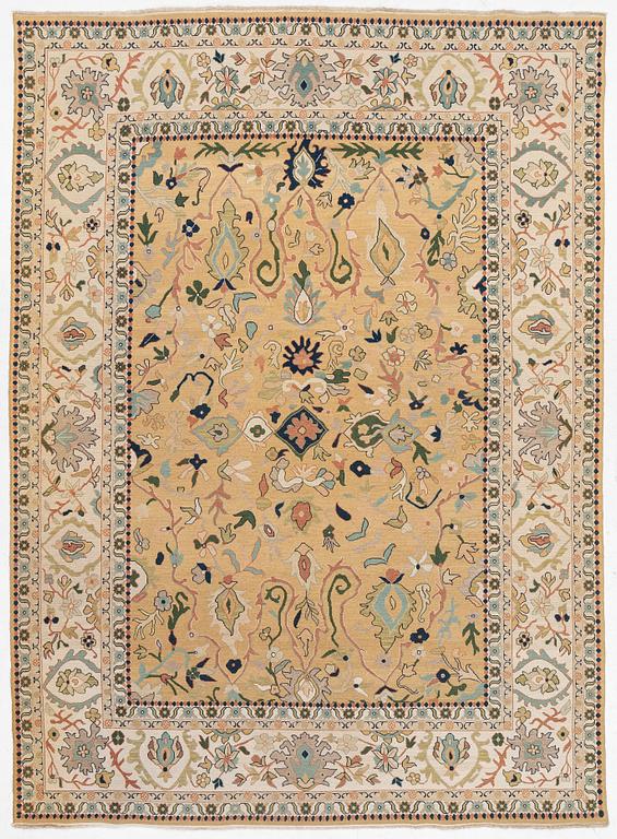 An Indian flat weave carpet of 'Shah Abbas' design, c. 402 x 289 cm.