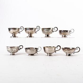 A Swedish 19th century set of eight silver cups, weight 168 grams.