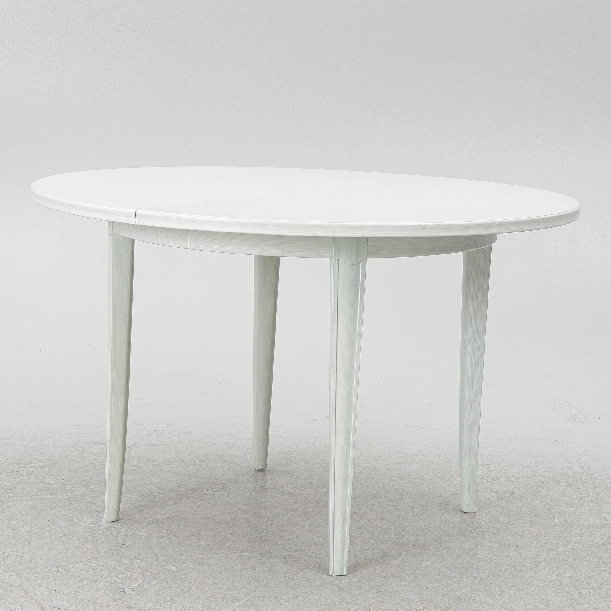 Carl Malmsten, a dinner table with six chairs, 'Brunnsviken', Sweden, second half of the 20th century.