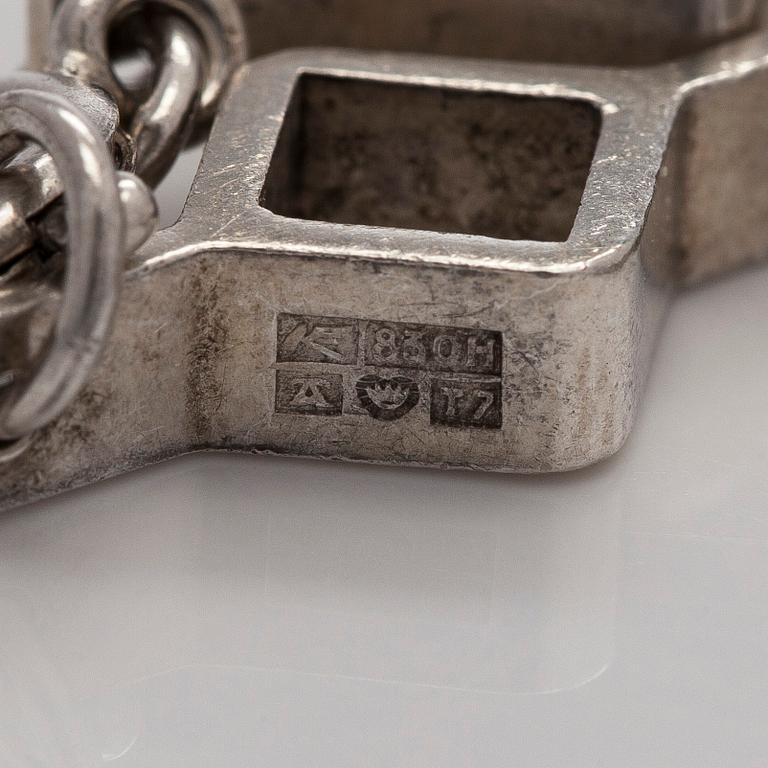 Jorma Laine, a set of two silver pendants, a bracelet and a brooch. Kultateollisuus Oy, Turku 1965-1972.